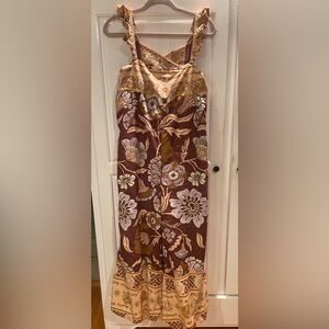 Free People Floral Patterned Brown and Cream Jumpsuit. Has a tie in the back.